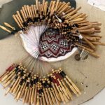 Exposition de dentelle dans l'ancienne église Saint-Gilles à Ambialet - ouvrage de dentellière
